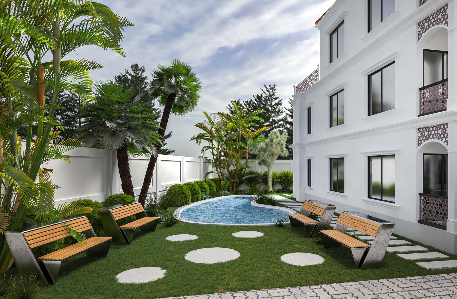 A beautifully landscaped backyard featuring a modern, white three-story building with large windows. The yard includes a uniquely shaped swimming pool surrounded by lush greenery, including various types of palm trees and other tropical plants. There are four contemporary wooden benches with metal frames arranged around the pool area, providing ample seating. The lawn is well-manicured with circular stepping stones leading to the pool, creating a visually appealing pathway. The overall design combines modern architecture with natural elements, offering a serene and inviting outdoor space.