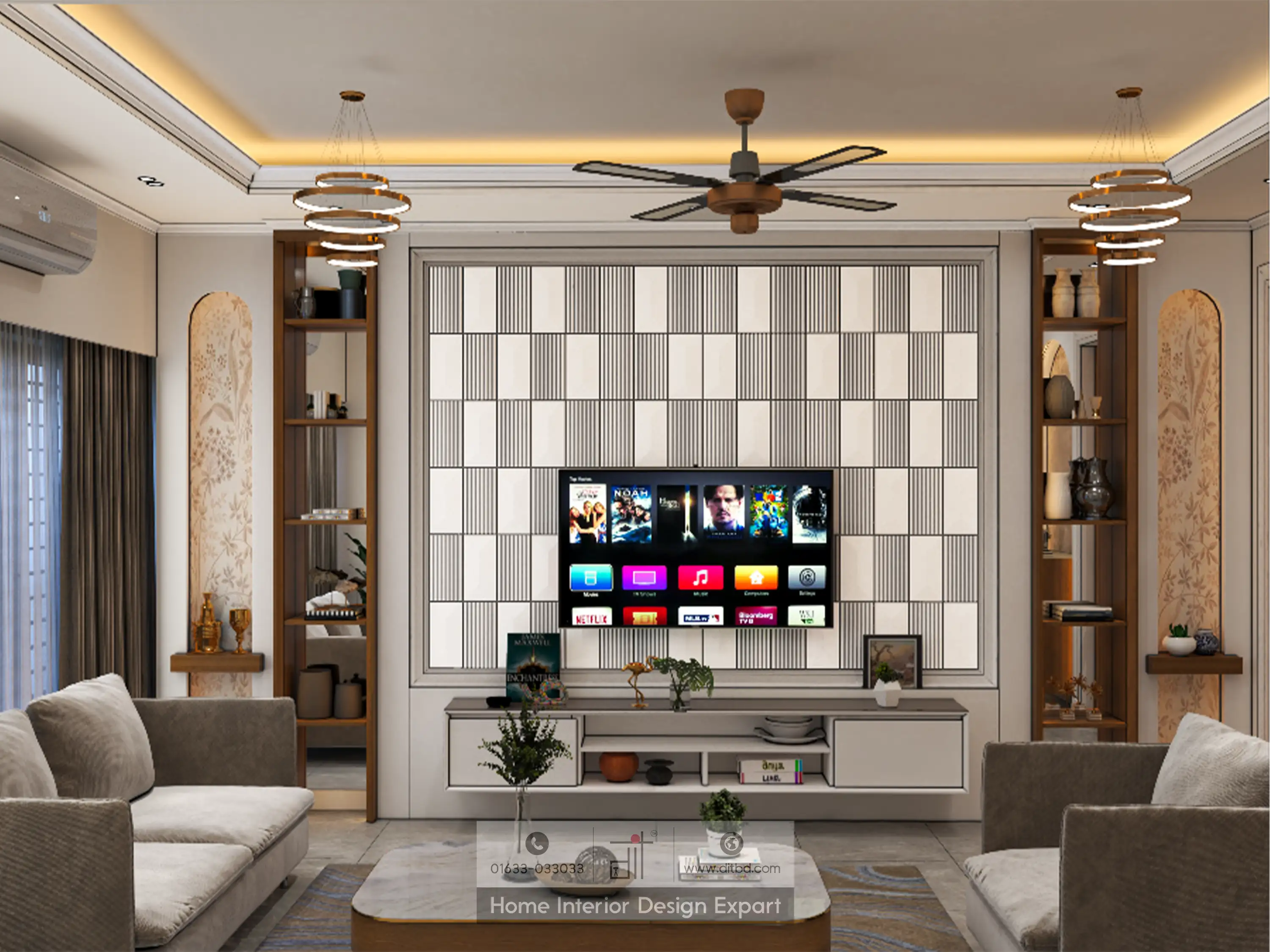 Modern living room with wall-mounted TV, white entertainment unit, built-in wooden shelves, ceiling fan, chandelier, and two sofas facing each other.