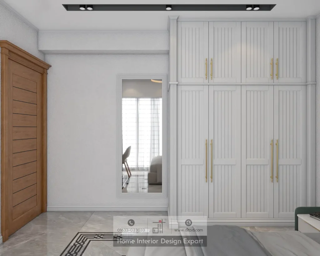 Built-in white fluted wardrobe with gold handles and full-length mirror in Dhanmondi 10A boys bedroom by DIT Studio