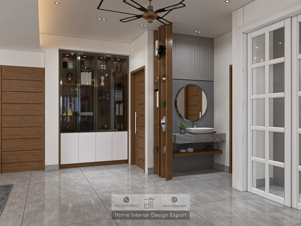 Foyer with walnut glass display cabinet and vessel sink wash station in Aftabnagar designed by DIT Studio