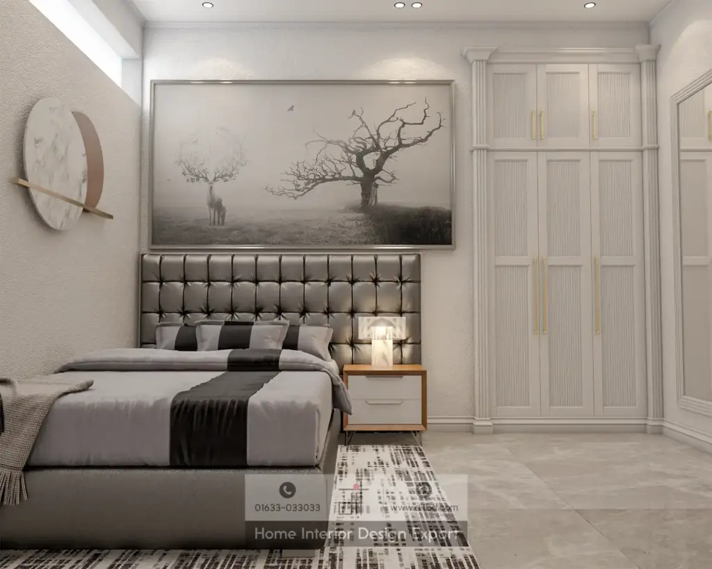 Guest bedroom with tufted headboard, landscape art, and white panelled wardrobe in Dhanmondi-10A by DIT Studio