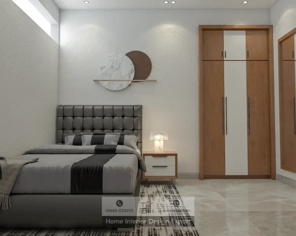 Guest bedroom bed view with walnut-and-white wardrobe and marble wall clock in Dhanmondi-10A by DIT Studio