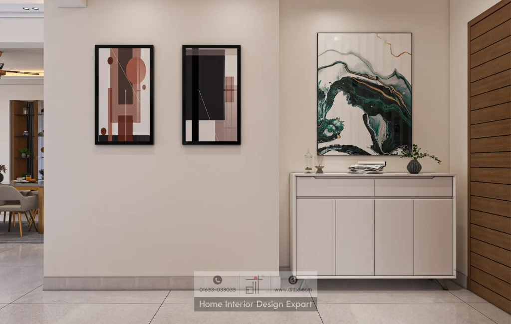 Foyer with white console cabinet, green marble-ink artwork, and geometric abstract prints in luxury Gulshan apartment by DIT Studio