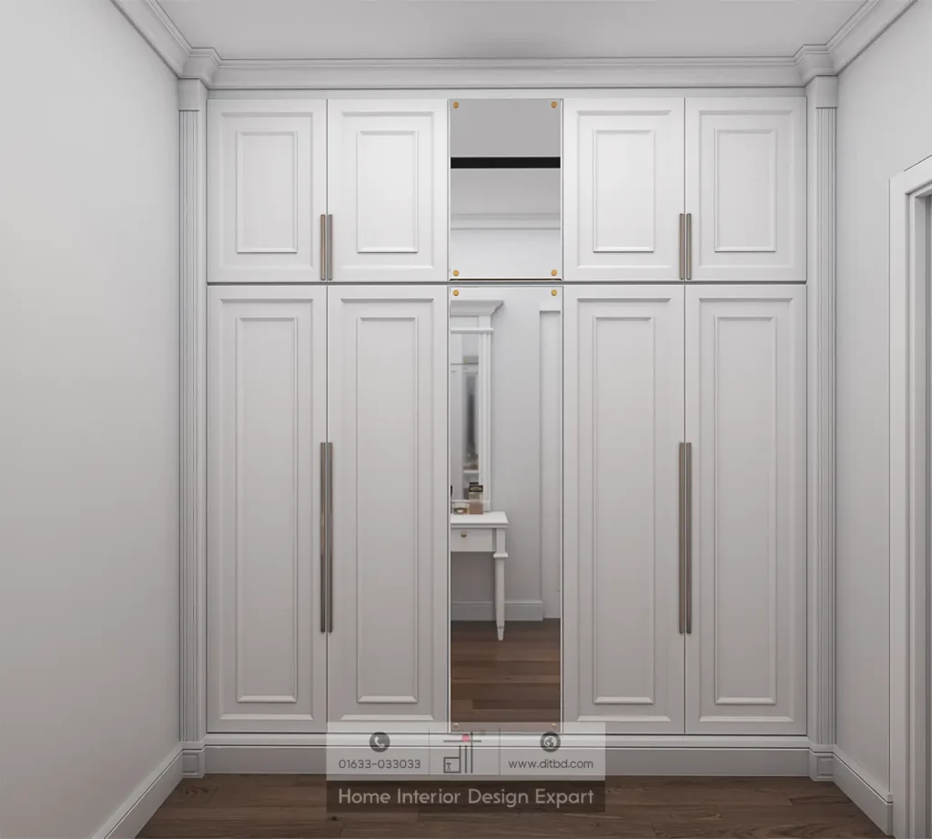 White panelled walk-in wardrobe with central mirror in girls bedroom in Maona Gazipur by DIT Studio