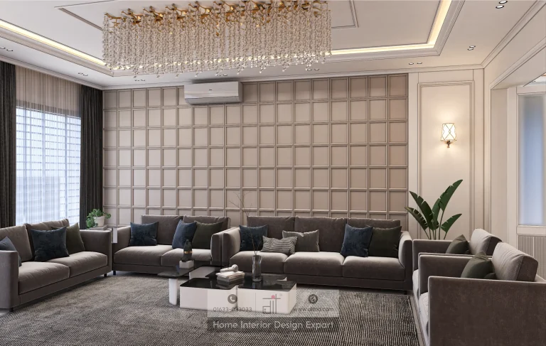Beige padded grid accent wall with dark grey sofa, navy cushions, and crystal chandelier in Gulshan living room by DIT Studio