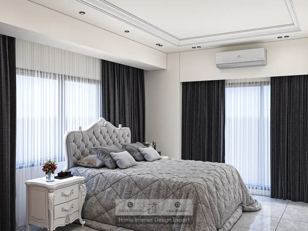 Alternate angle showing quilted silver bed, walnut bookshelf desk, and white French nightstand in master bedroom by DIT Studio