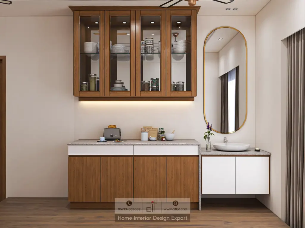 Close-up of walnut glass-fronted display cabinet with crockery and oval gold-rimmed mirror in Basila common area by DIT Studio