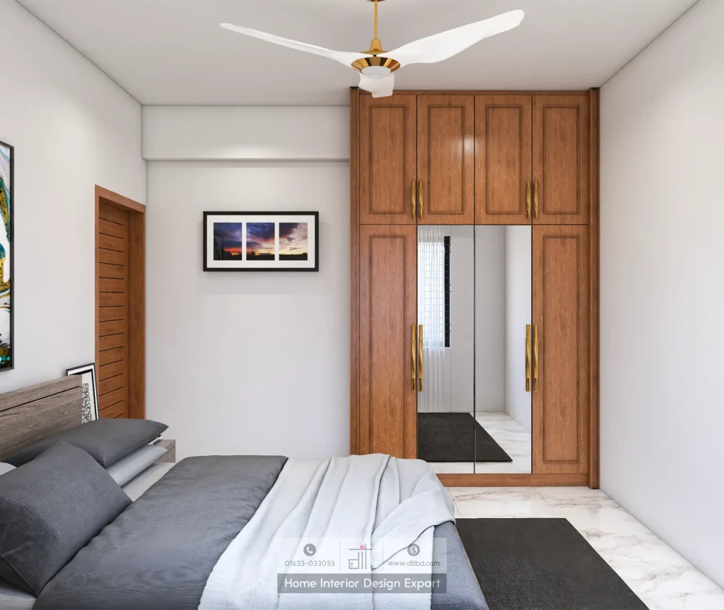 Floor-to-ceiling walnut wardrobe with mirrored doors in guest bedroom by DIT Studio in Uttara Dhaka