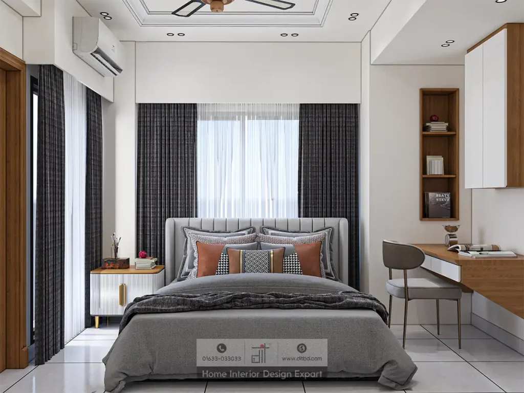 Modern bedroom with grey channel-tufted headboard and burnt orange cushions in Aftabnagar by DIT Studio