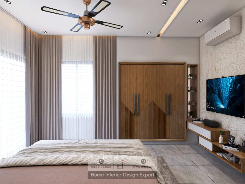 Walnut diamond-pattern wardrobe with wall-mounted TV in Dhanmondi apartment by DIT Studio