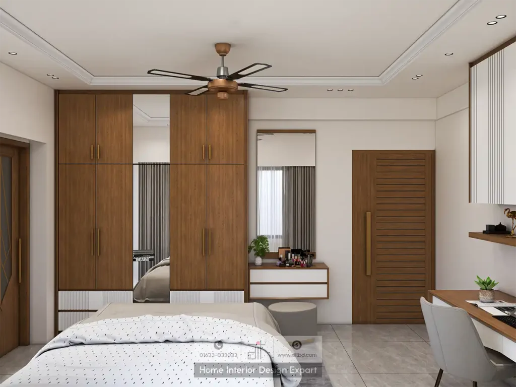 Floor-to-ceiling walnut wardrobe with brass handles, full-length mirror and dressing table in Basila by DIT Studio