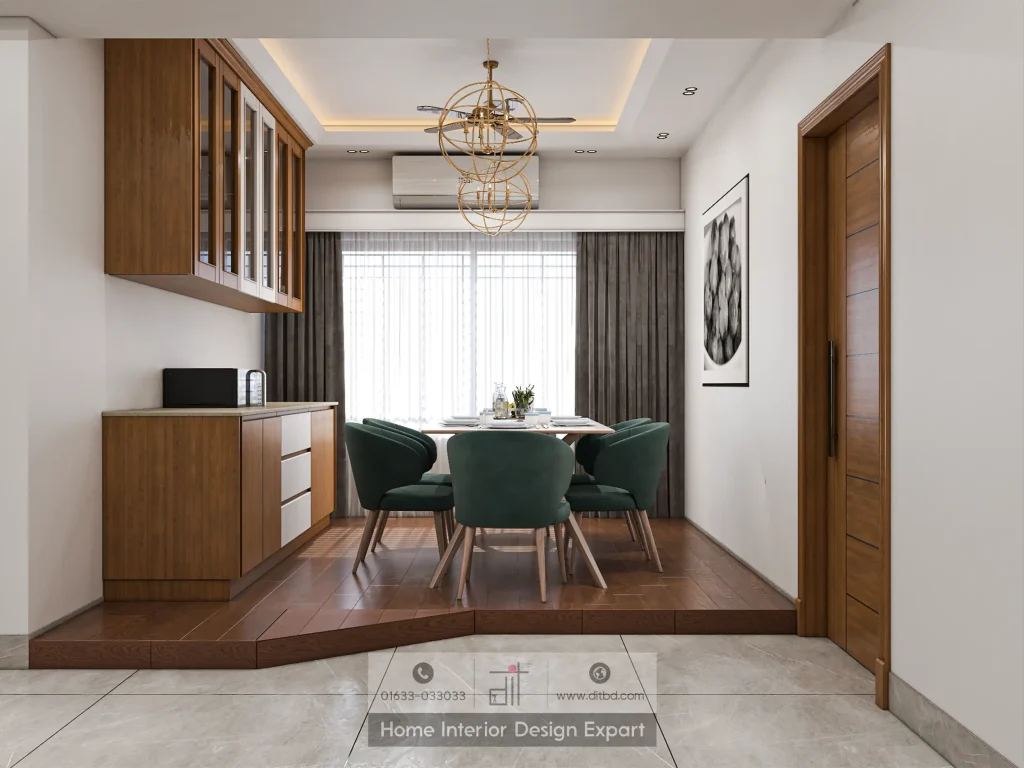 Raised dining platform with green velvet chairs and gold chandelier in Dhanmondi apartment by DIT Studio