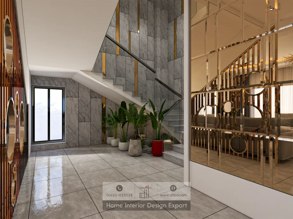 Under-staircase area with grey stone cladding, indoor plants, and gold mirror wall in DIT Studio Keraniganj project