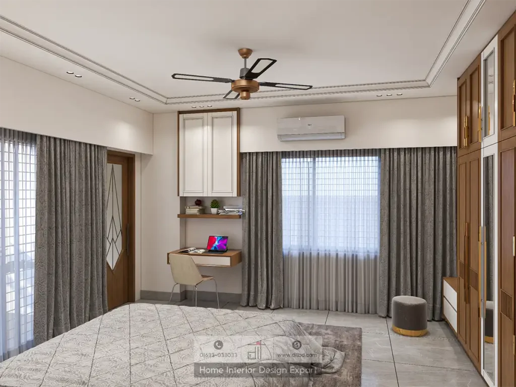 Study corner with floating walnut desk, overhead white cabinet, and grey curtains in modern master bedroom by DIT Studio