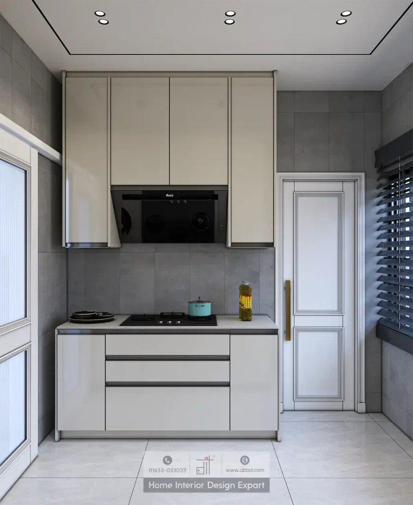 Modular kitchen cooking station with cream cabinets, gas hob and black range hood in Dhanmondi-6A by DIT Studio