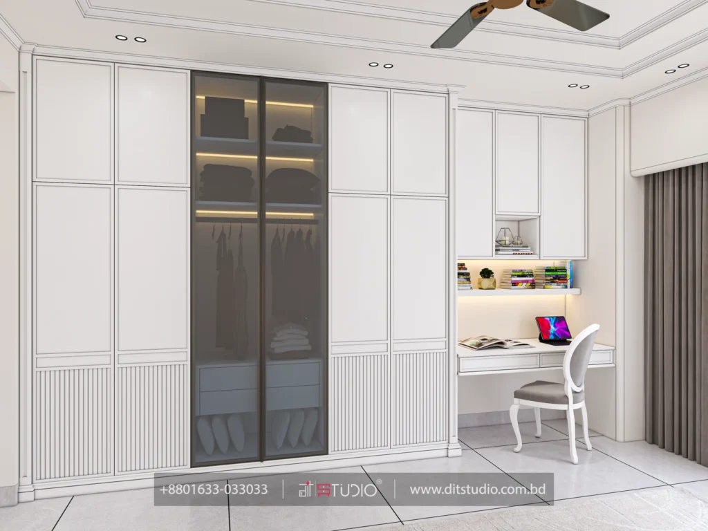 Wardrobe wall in white with lit interior shelves, fluted base panels and a study desk