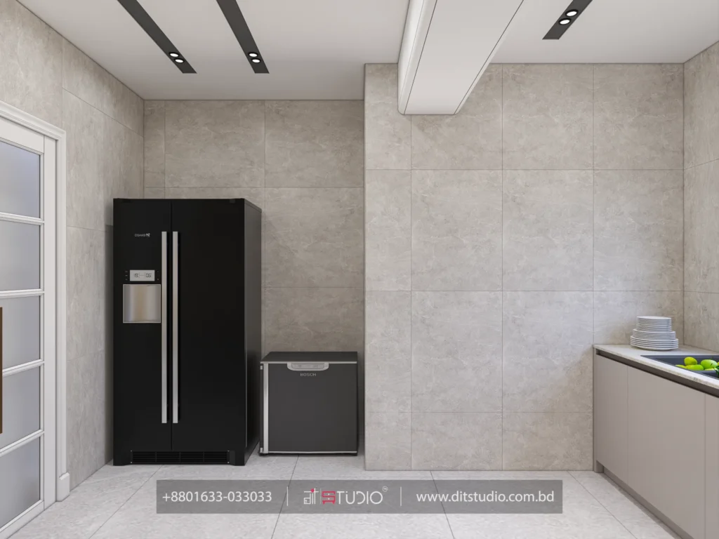 Kitchen with black side by side refrigerator, compact freezer and grey stone tile walls