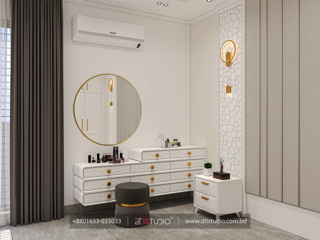 Dressing detail with round gold mirror, textured drawers, dark stool and gold ring sconce