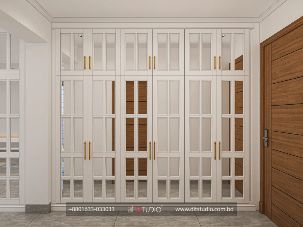 Six door mirrored wardrobe in white with gold handles beside a wooden bedroom door