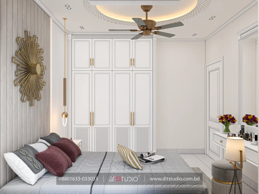 Bedroom with tall white panelled wardrobe, gold sunburst wall art and a dressing table